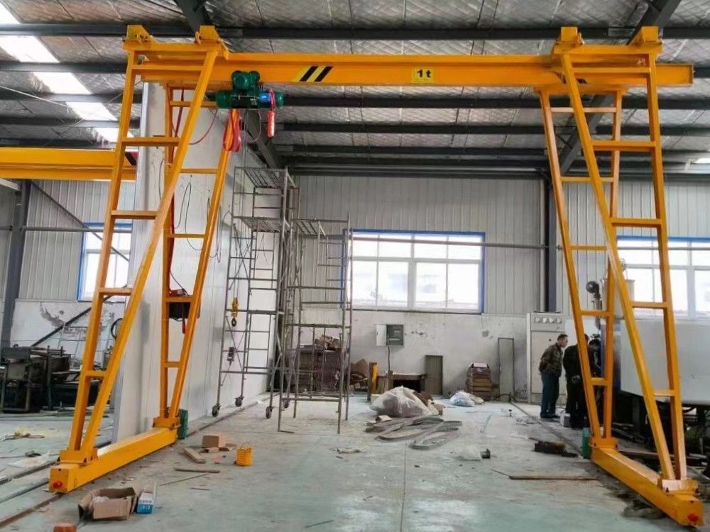 龍門吊廠家生產(chǎn)，手推型/電動型小型門式起重機制造安裝調(diào)試